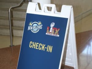 A-frame signage for Super Bowl LIX Host Committee check-in