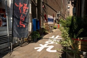 Concrete decals, feather flag, posters and heat applied graphics/brick decal- House of Suntory activation with Gradient Experiential (Bryce Ell Photography)