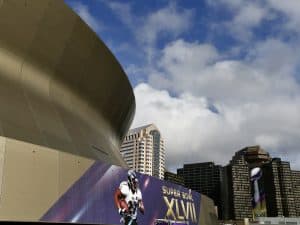 Super Bowl XLVII building wraps on the Mercedes-Benz Superdome and Benson Tower (Perry Knotts/NFL)